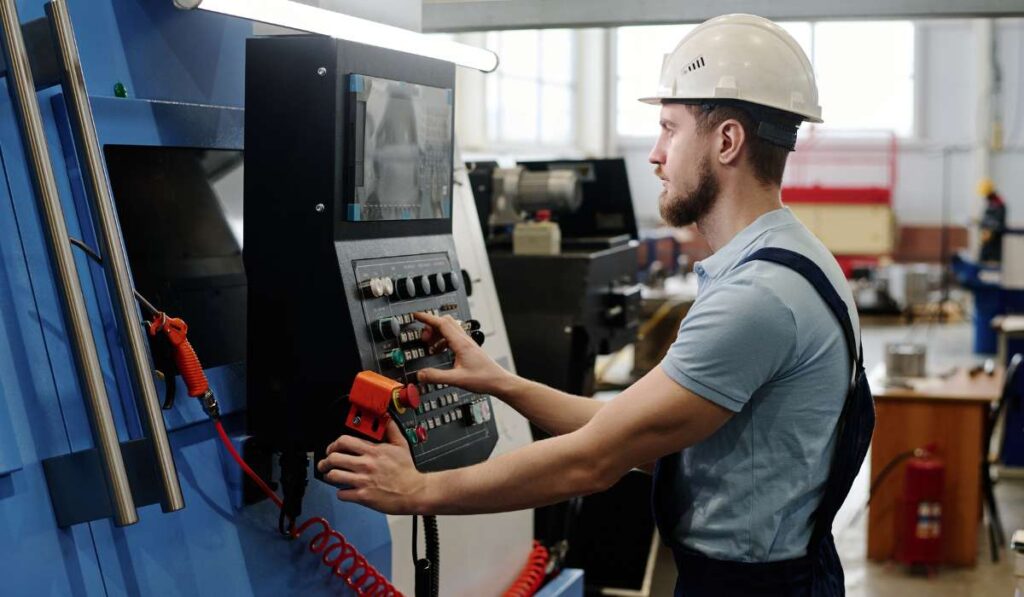 Engineer operating CNC machine in India’s top bending company